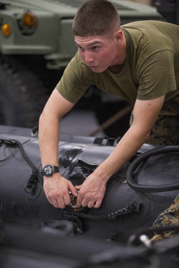 Pfc. Remington J. Heishman prepares a combat rubber reconnaissance crafts (CRRC) for a boat raid during Blue Chromite 2017 in Okinawa, Japan, October 29, 2016. Blue Chromite is a U.S. –only exercise which strengthens the Navy-Marine Corps expeditionary, amphibious rapid-response capabilities based in Okinawa and the greater Indo-Asia-Pacific region. Heishman is a rifleman assigned to 3rd Battalion, 3rd Marine Regiment which is forward deployed from Kaneohe Bay, Hawaii, to 3rd Marine Division, based in Okinawa, Japan (U.S. Marine Corps photo by Lance Cpl. Jesus McCloud)