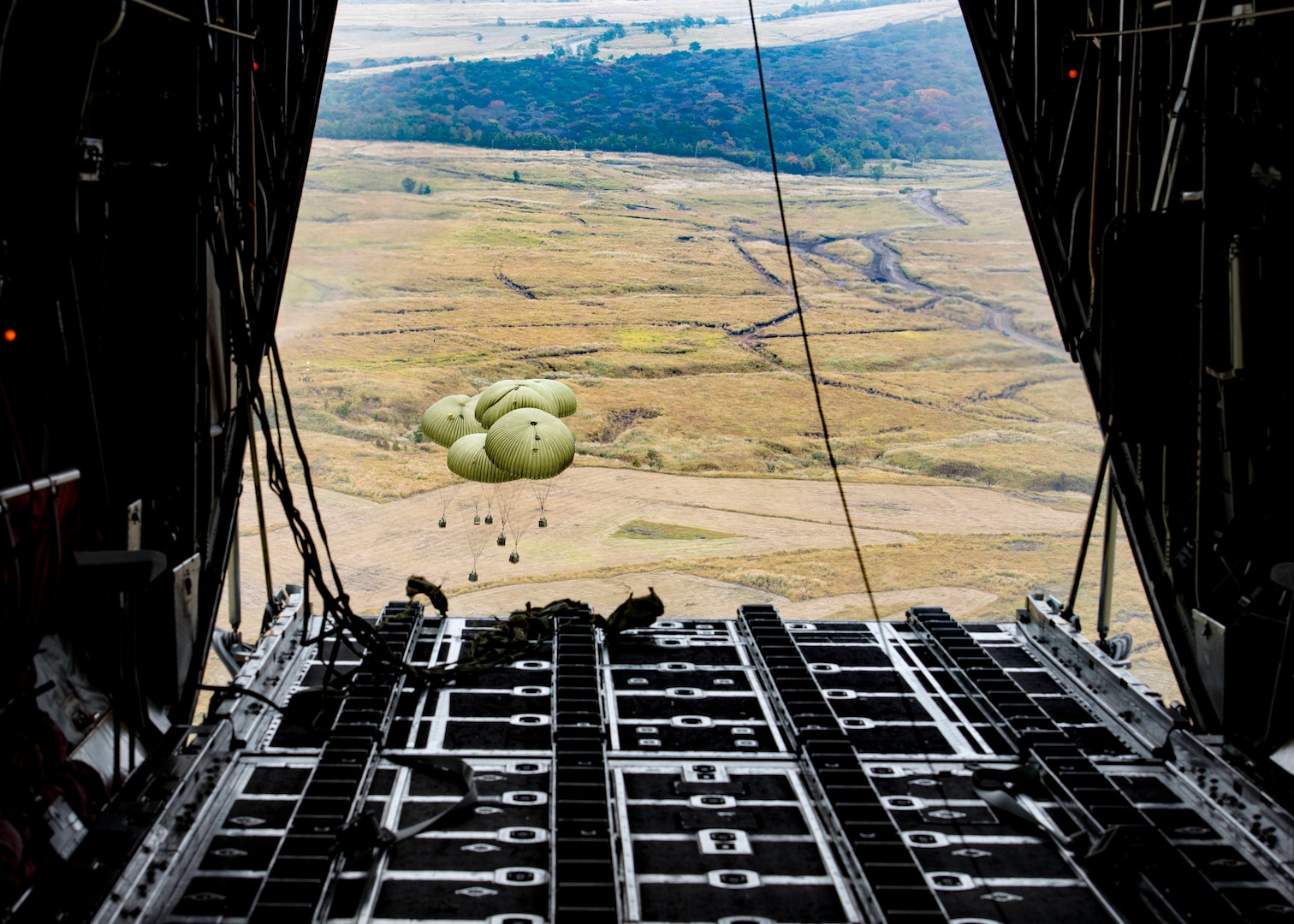 Japan Ground Self-Defense Force container delivery system bundles parachute to a drop zone after being dropped out of a C-130 Hercules during Keen Sword 2017, Nov. 10, 2016, over the Kyushu prefecture, Japan. Keen Sword is designed to practice the critical capabilities to support the defense of Japan, and to respond to a potential crisis or contingency in the Indo-Asia-Pacific region. (U.S. Air Force photo by Airman 1st Class Donald Hudson/Released)