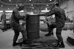 Japan Ground Self-Defense Force members prepare to construct a container delivery system bundle at Yokota Air Base, Japan, Nov. 7, 2016. As part of Keen Sword 17, U.S. and Japan Self-Defense Force members participated in C-17 Globemaster III tie-down training, UH-1N Iroquois night flight familiarization and C-130 Hercules container delivery system bundle drops, each designed to increase combat readiness and interoperability within the framework of the U.S.-Japan alliance. (U.S. Air Force photo by Senior Airman Delano Scott/Released)