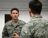 U.S. Air Force Col. Bradley Spears, left, 521st Air Mobility Operations Wing vice commander, speaks to U.S. Air Force 1st. Lt. Christopher Gingerelli, 727th Air Mobility Squadron Air Freight officer in charge, during a tour of base Nov. 9, 2016, on RAF Mildenhall, England. Spears met Airmen during a tour of combat readiness and resources, the air terminal operations center, air freight and the passenger terminal. (U.S. Air Force photo by Gina Randall)