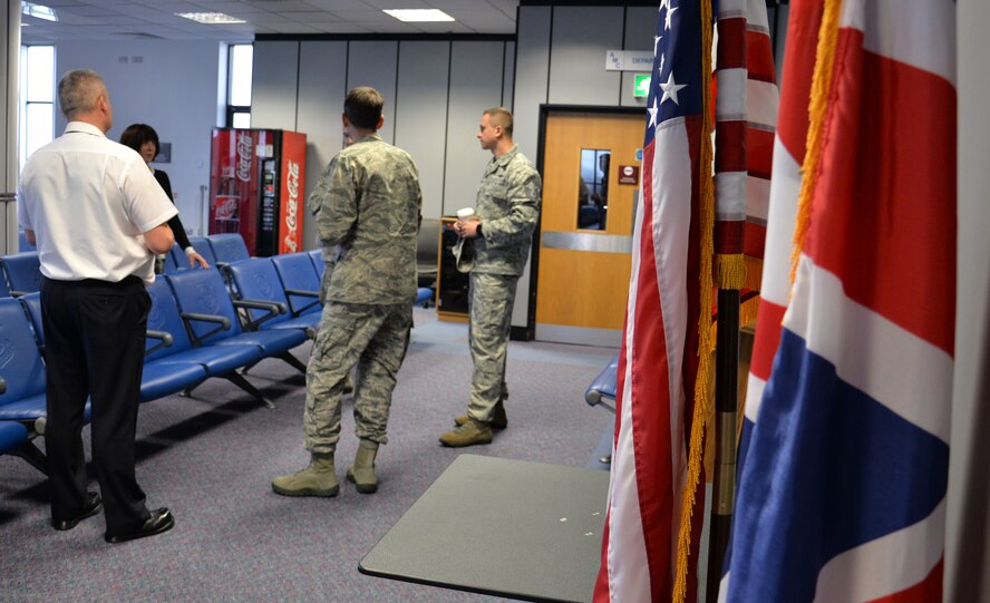 U.S. Air Force Col. Bradley Spears, second from right, 521st Air Mobility Operations Wing vice commander, visits with Airmen from the 727th Air Mobility Squadron during a tour of base Nov. 9, 2016, on RAF Mildenhall, England. Spears gained an inside view of how American and British personnel work as a team to carry out the mission. (U.S. Air Force photo by Gina Randall)