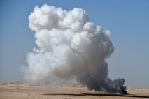 Smoke billows out of the munitions burn pile at an undisclosed location in Southwest Asia Nov. 9, 2016. (U.S. Air Force photo by Senior Airman Andrew Park)
