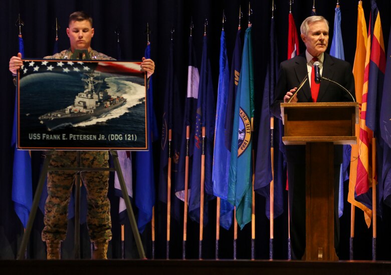 Secretary of the Navy, the Honorable Ray Mabus speaks during a ceremony at Marine Corps Air Station Cherry Point, N.C., Nov. 9, 2016. During the ceremony, Mabus announced that the Arleigh Burke-class destroyer, DDG 121, will be named the USS Frank E. Petersen Jr., in honor of the Marine Corps lieutenant general who was the first African-American Marine Corps aviator and Marine Corps general officer. Petersen was the first African-American Marine Corps aviator and general officer. He retired from the Marine Corps in 1988 after 38 years of service. Mabus also awarded MCAS Cherry Point with a certificate of achievement for its Blue level of achievement in the Fiscal Year 2016 SecNav Energy and Water Management Awards, for a well-rounded energy or water program. (U.S. Marine Corps photo by Cpl. Jason Jimenez/ Released)