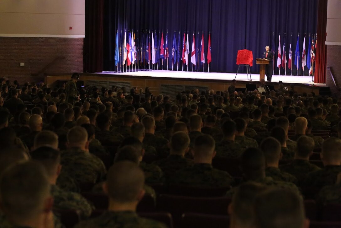 Secretary of the Navy, the Honorable Ray Mabus speaks during a ceremony at Marine Corps Air Station Cherry Point, N.C., Nov. 9, 2016. During the visit, Mabus announced that the Arleigh Burke-class destroyer, DDG 121, will be named the USS Frank E. Petersen Jr., in honor of the Marine Corps lieutenant general who was the first African-American Marine Corps aviator and Marine Corps general officer. Mabus also awarded MCAS Cherry Point with a certificate of achievement for its Blue level of achievement in the Fiscal Year 2016 SecNav Energy and Water Management Awards, for a well-rounded energy or water program. (U.S. Marine Corps photo by Sgt. N.W. Huertas/ Released) 
