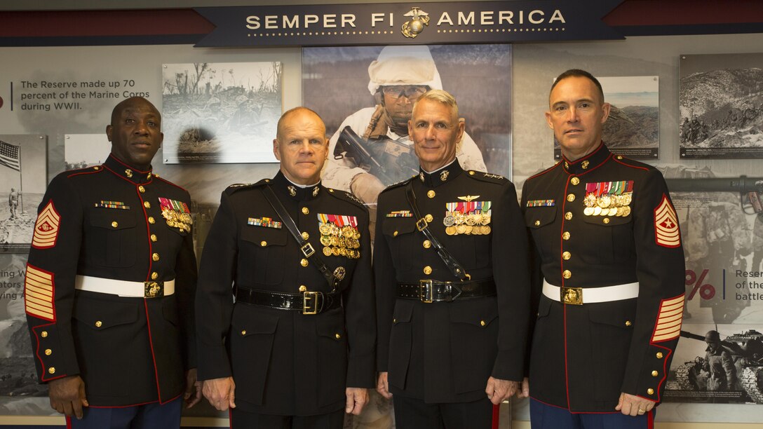 Sgt. Maj. Ronald L. Green, sergeant major of the Marine Corps, Gen. Robert B. Neller, commandant of the Marine Corps, Lt. Gen. Rex C. McMillian, commander of Marine Forces Reserve and Marine Forces North, and Sgt. Maj. Patrick L. Kimble, sergeant major of MARFORRES and MARFORNORTH, pose for a photo at a ribbon-cutting ceremony for the official unveiling of the Marine Corps Reserve Centennial wall display at the Pentagon, Arlington, Va., Nov. 9, 2016. The exhibit was installed at the Pentagon in conjunction with the 100th anniversary of the Marine Corps Reserve, which was celebrated Aug. 29, 2016. For more information on the history and heritage of the Marine Corps Reserve as well as current Marine stories and upcoming Centennial events, please visit www.marines.mil/usmcr100.