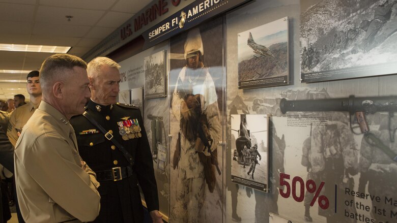 Lt. Gen. Rex C. McMillian, commander of Marine Forces Reserve and Marine Forces North, and Lt. Gen. Jon M. Davis, deputy commandant for Marine Corps aviation, view the Marine Corps Reserve Centennial wall display at the Pentagon, Arlington, Va., Nov. 9, 2016. The exhibit was installed at the Pentagon in conjunction with the 100th anniversary of the Marine Corps Reserve, which was celebrated Aug. 29, 2016. For more information on the history and heritage of the Marine Corps Reserve as well as current Marine stories and upcoming Centennial events, please visit www.marines.mil/usmcr100.
