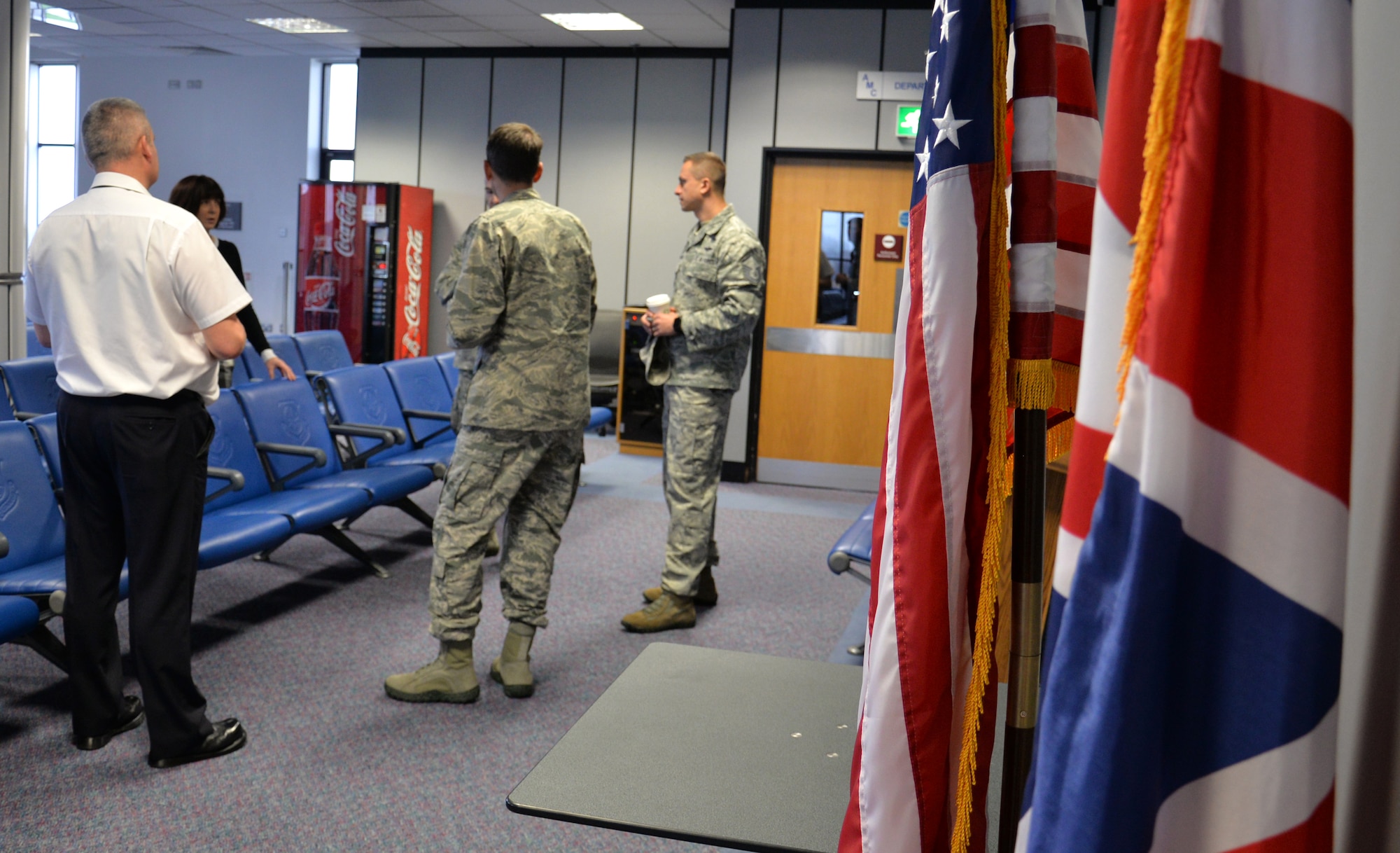 U.S. Air Force Col. Bradley Spears, second from right, 521st Air Mobility Operations Wing vice commander, visits with Airmen from the 727th Air Mobility Squadron during a tour of base Nov. 9, 2016, on RAF Mildenhall, England. Spears gained an inside view of how American and British personnel work as a team to carry out the mission. (U.S. Air Force photo by Gina Randall)