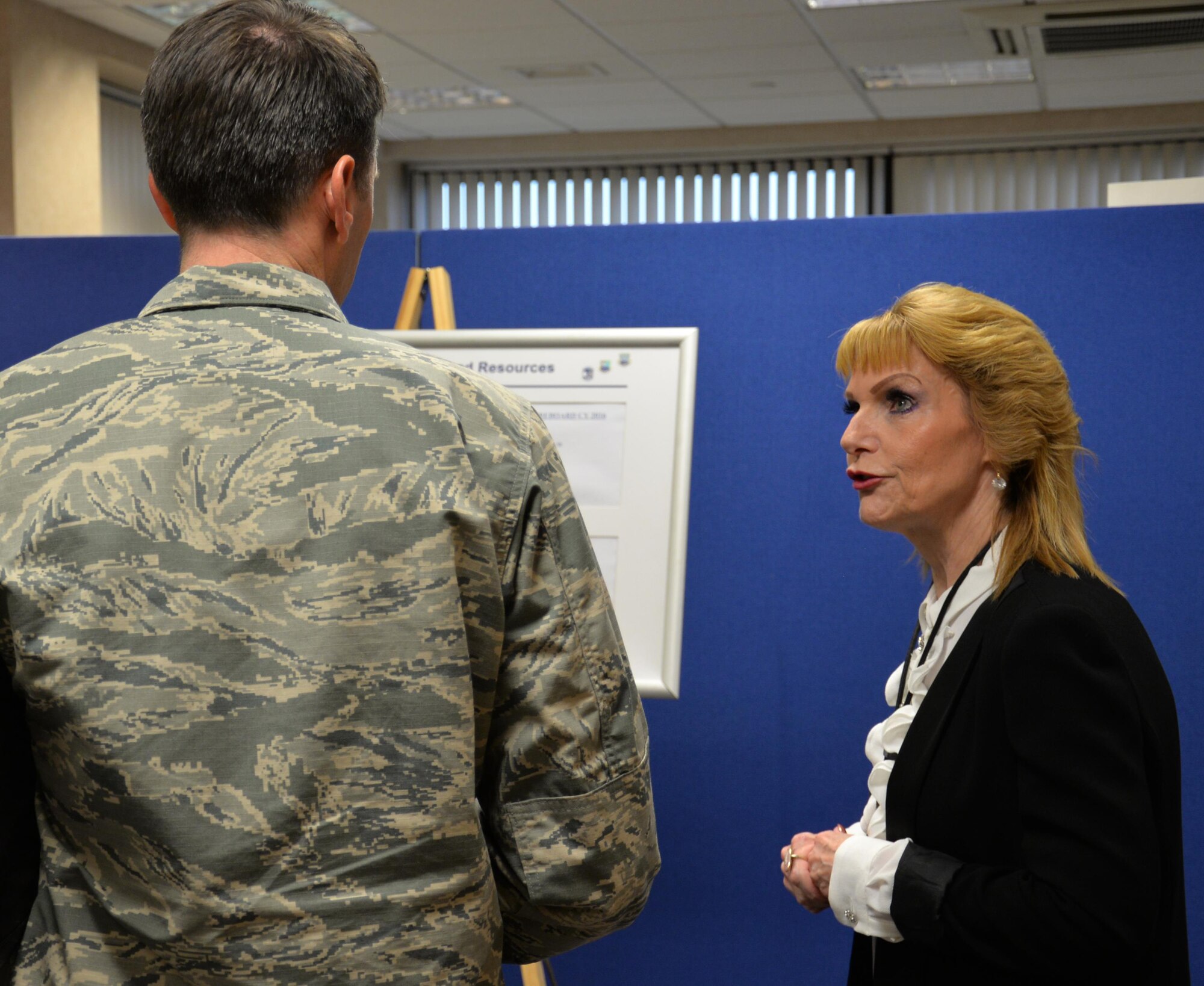 U.S. Air Force Col. Bradley Spears, left, 521st Air Mobility Operations Wing vice commander, speaks to Kym Stevenson, 727th Air Mobility Squadron Combat Readiness and Resources flight chief, during a tour Nov. 9, 2016, on RAF Mildenhall, England. Spears spoke to military personnel as well as Ministry of Defence employees to see what he could do to help them carry out the mission. (U.S. Air Force photo by Gina Randall)