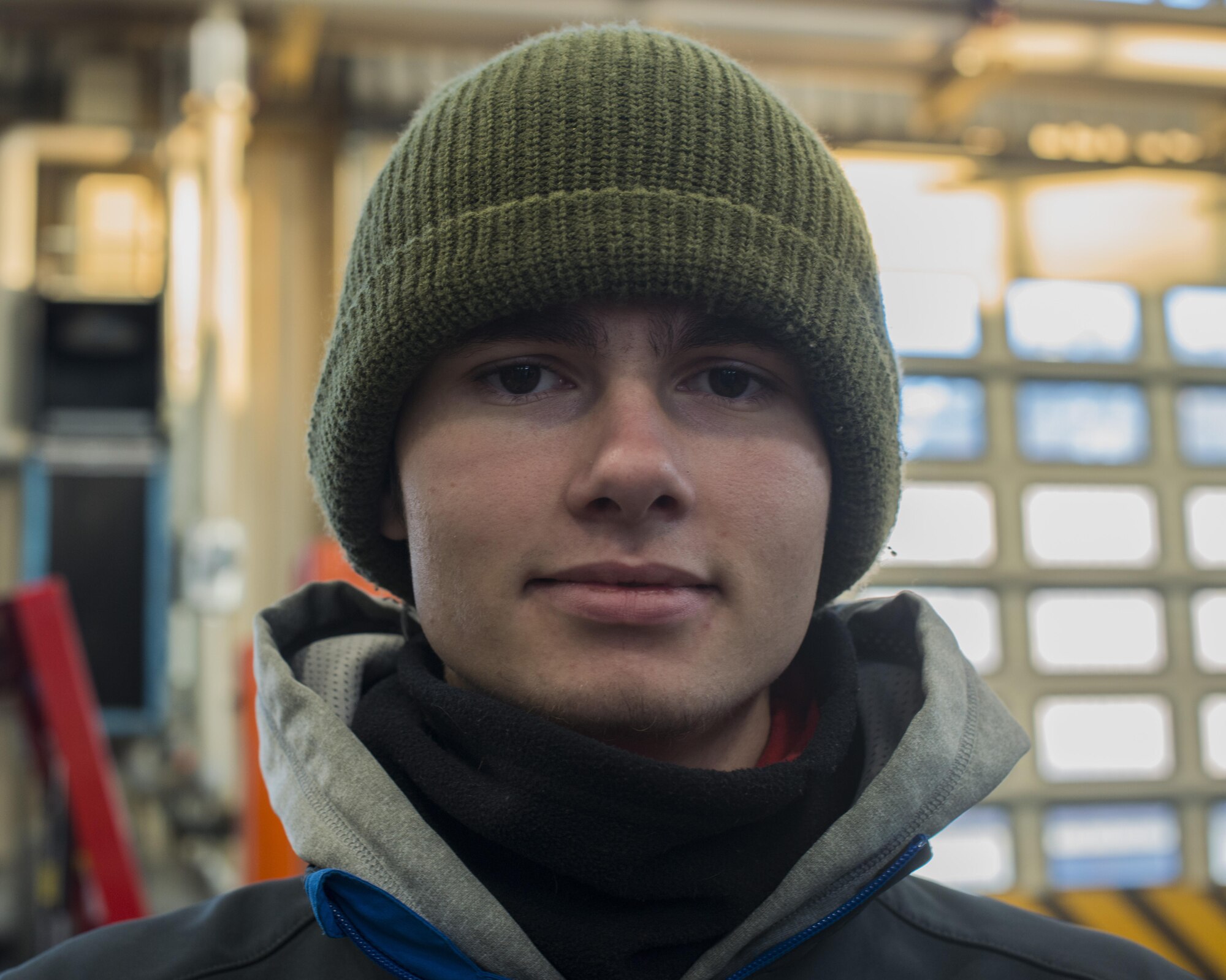 Hendrik Ecker, 86th Vehicle Readiness Squadron vehicle mechanic technician, apprentices at the 86th VRS at Ramstein Air Base, Germany, Nov. 14, 2016. Ecker applied for the position through Ramstein’s Local National Apprenticeship program and was partnered with the squadron to learn hands-on vocational training and classroom education. He is specializing in large vehicle maintenance.  (U.S. Air Force photo by Senior Airman Tryphena Mayhugh)