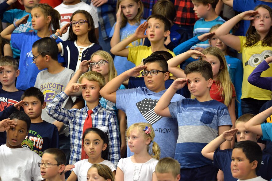Students render a salute to the veterans during the annual Veterans Day ceremony at Ellicott, Colorado, Thursday, Nov. 10, 2016.  Nearly every student in the district has a family member who has served, or is currently serving, in the armed forces. (U.S. Air Force Photo/Dennis Rogers)