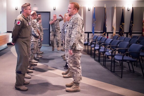Green Dot atendees participate in an icebreaker activity during training Nov. 5 at Keesler Air Force Base, Miss. Green Dot is the U.S. Air Force's program to help raise awareness of and prevent sexual assault, domestic violence and stalking. (U.S. Air Force photo/Staff Sgt. Heather Heiney)