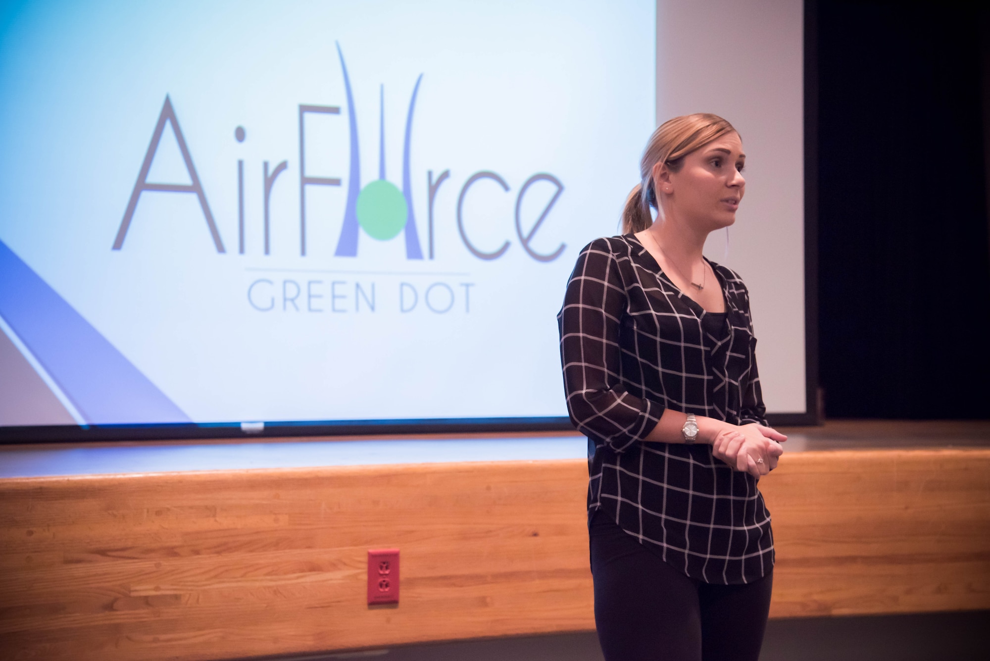 Staff Sgt. Kayla Kappel, 403rd Financial Management Office technician teaches 403rd Wing members about Green Dot during a training class at Keesler Air Force Base, Miss. Nov. 5. Green Dot is the U.S. Air Force's program to help raise awareness of and prevent sexual assault, domestic violence and stalking. (U.S. Air Force photo/Staff Sgt. Heather Heiney)