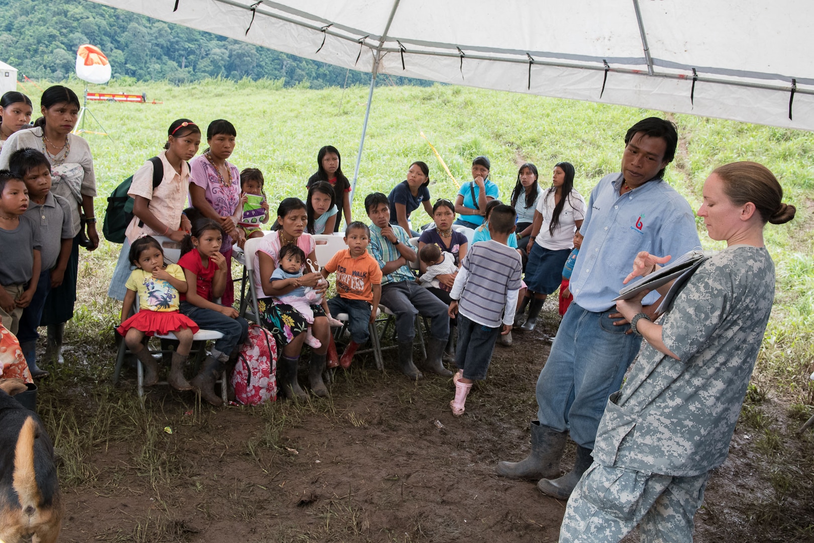 Army Staff Sgt. Lisa Kent, Joint Task Force-Bravo preventive medicine technician, instructs a family on preventive health practices during Operation Pura Vida, a joint humanitarian mission and Medical Readiness Training Exercise at an indigenous region in the Caribbean province of Limón, Nov. 1 to 3. The group arrived in four helicopters from the 1st Battalion 228th Aviation Regiment and joined 30 Costa Rican physicians to provide basic healthcare services to approximately 300 residents of the indigenous village of Piedra Mesa, Telire region of Talamanca, Limón