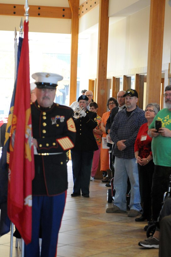 WAUWATOSA, Wisconsin (November 9, 2016) – Army Staff Sgt. Christy Gervais, left, 484th Army Band, plays the each services’ song and hymn during the Luther Manor Veterans Memorial dedication ceremony, November 9. The ceremony marked the unveiling of the memorial that honors the more than 120 veteran residents of Luther Manor as well as all those that have and will live there.