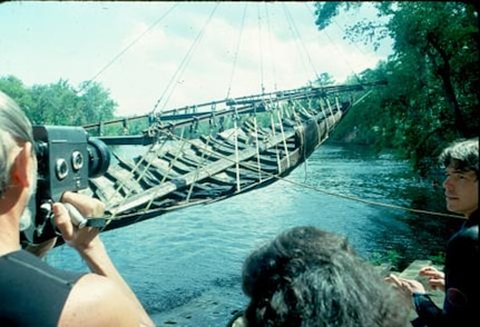 In 1976, approximately eight thousand people line the banks of the Black River in Georgetown, South Carolina to watch as the early 18th century colonial merchant ship at Brown's Ferry is raised.