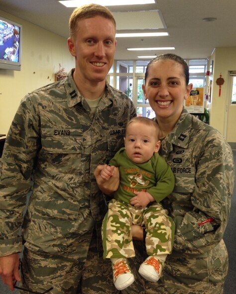 Office visit photo with Then-Capt. Chad Evans and wife, Capt. Kate Evans.