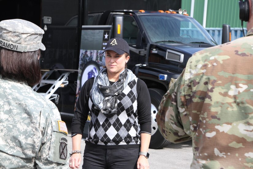 SAN ANTONIO – West Point graduate, Army Reserve Col. Brandi Bryan Peasley, gets interviewed during the ‘Army versus Irish’ tailgate by local public affairs Soldiers November 12, 2016. Peasley was one of the many West Point alumni attending the tailgate and game. Every year since 1970 the city has come together for events like the West Point Tailgate during the two weeks of Celebrate America’s Military.