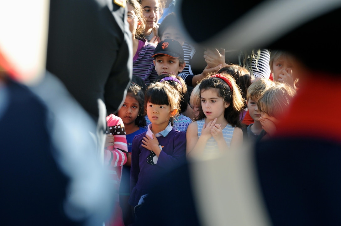 Elementary students recite the Pledge of Allegiance at a flag raising ceremony conducted by the 63rd Regional Support Command, Nov. 10, Christa McAuliffe Elementary School, Saratoga, Calif. (U.S. Army Reserve photo by Alun Thomas, 63rd RSC Public Affairs)