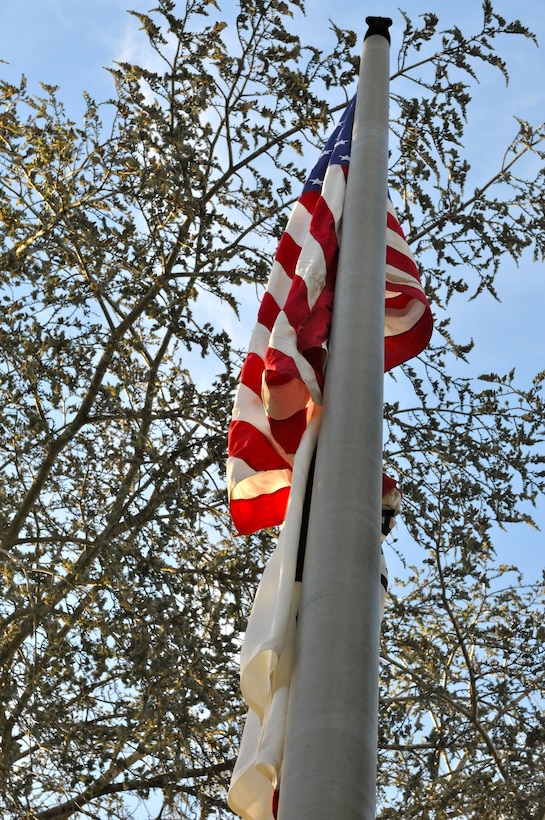 The U.S. flag stands atop the flagpole after being raised at a flag raising ceremony conducted by the 63rd Regional Support Command, Nov. 10, Christa McAuliffe Elementary School, Saratoga, Calif. (U.S. Army Reserve photo by Alun Thomas, 63rd RSC Public Affairs)