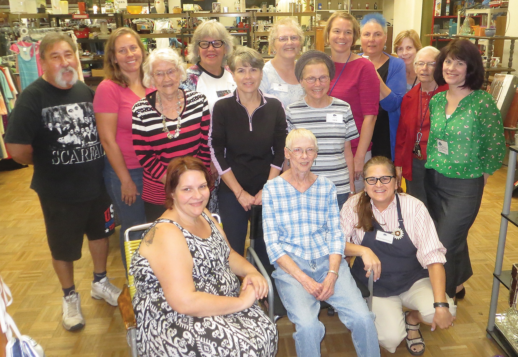 Kirtland Spouses' Club volunteers pause from their work at the KSC Thrift Shop.  Proceeds from the thrift shop go to community grants and scholarships. (Courtesy photo)