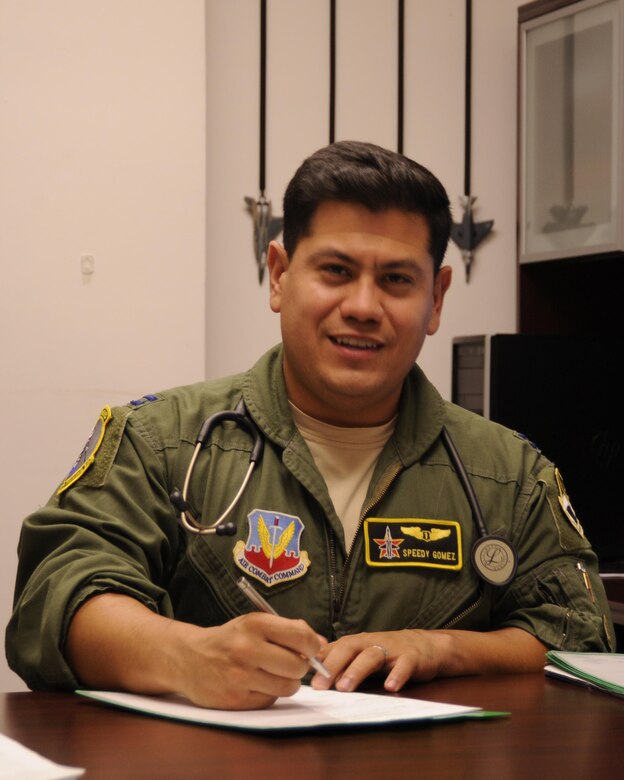U.S. Air Force Capt. Julio Gomez, 325th Aerospace Medicine Squadron flight surgeon, reviews medical reference material Oct. 25, 2016. Flight surgeons like Gomez support Tyndall’s mission of training and projecting unrivaled combat airpower by providing medical and preventitive care. This enables all wing and associate units to maximize readiness and combat capability. (U.S. Air Force photo by Senior Airman Solomon Cook/Released)