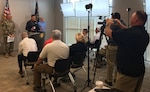 Soldiers assigned to Army North along with civilians working for the Federal Emergency Management Agency, or FEMA, and other Oregon state agencies take part in a mock press conference at the Oregon National Guard center in Clackamas, outside of Portland, Ore., Nov. 1. More than 60 people from U.S. Army North, FEMA, National Guard and state agencies converged at the center to conduct certification training.