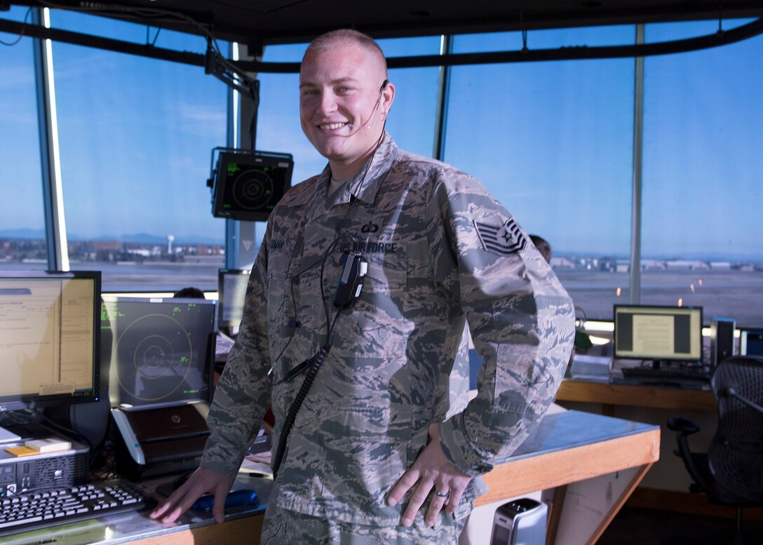Tech. Sgt. Adam J. Blizman, 92nd Operations Support Squadron Air Traffic Control Tower watch supervisor, stands in front of a doppler radar station in the air traffic control tower Nov 10, 2016, at Fairchild Air Force Base. Showing outstanding leadership led to his selection as one of Fairchild’s Finest, a weekly recognition program that highlights top-performing Airmen. (U.S. Air Force photo/Airman 1st Class Ryan Lackey)