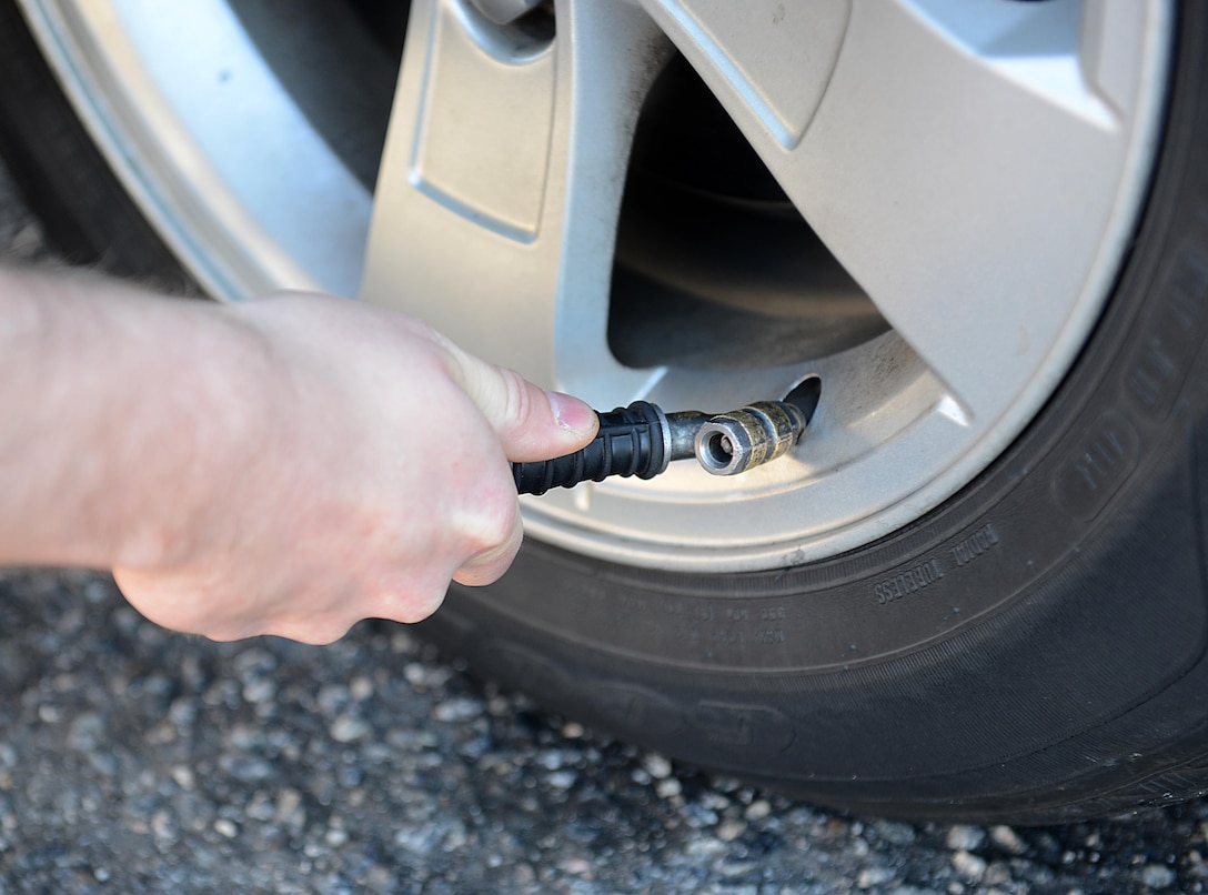 Before long travel, check tire pressure in all tires, including spare tires, and fill them to the recommended level on the vehicle’s tire information placard, certification label, or in the owner’s manual. Don’t rush when traveling and remain vigilant as tires can lose air suddenly if you drive over a pothole, other object or if you strike the curb when parking. (U.S. Air Force photo by Staff Sgt. Teresa J. Cleveland)