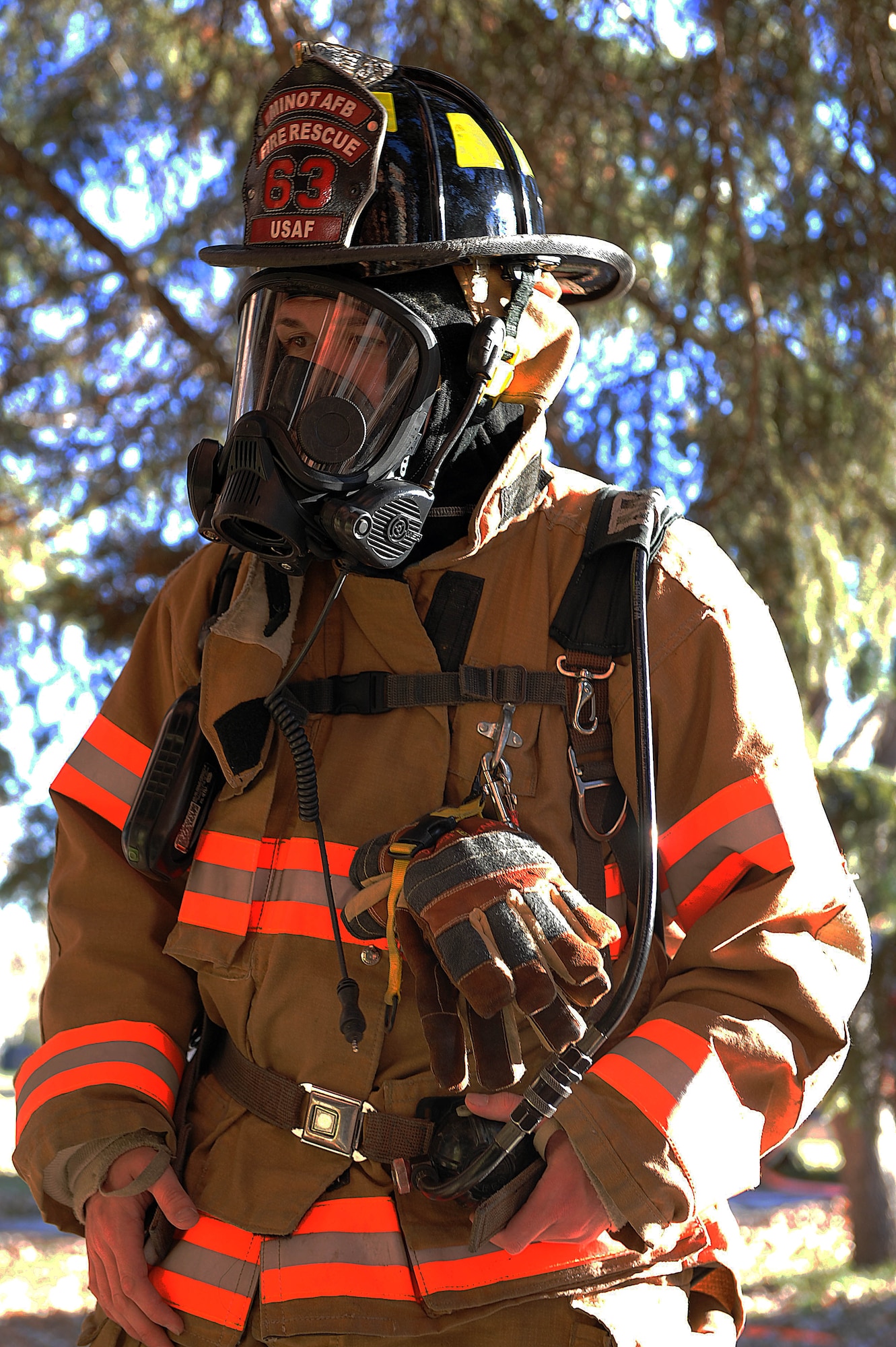 Airman 1st Class Benjamin Cox, 5th Civil Engineer Squadron firefighter prepares to enter a building during a training exercise at Minot Air Force Base, N.D., Nov. 9, 2016. The fire protection flight routinely trains to ensure readiness for any emergencies on base. (U.S. Air Force photo/Senior Airman Kristoffer Kaubisch)