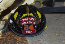 A firefighter’s helmet lays on the ground at Minot Air Force Base, N.D., Nov. 9, 2016. The fire protection flight helps protect base personnel, property and the environment from fires and disasters. (U.S. Air Force photo/Airman 1st Class Christian Sullivan)