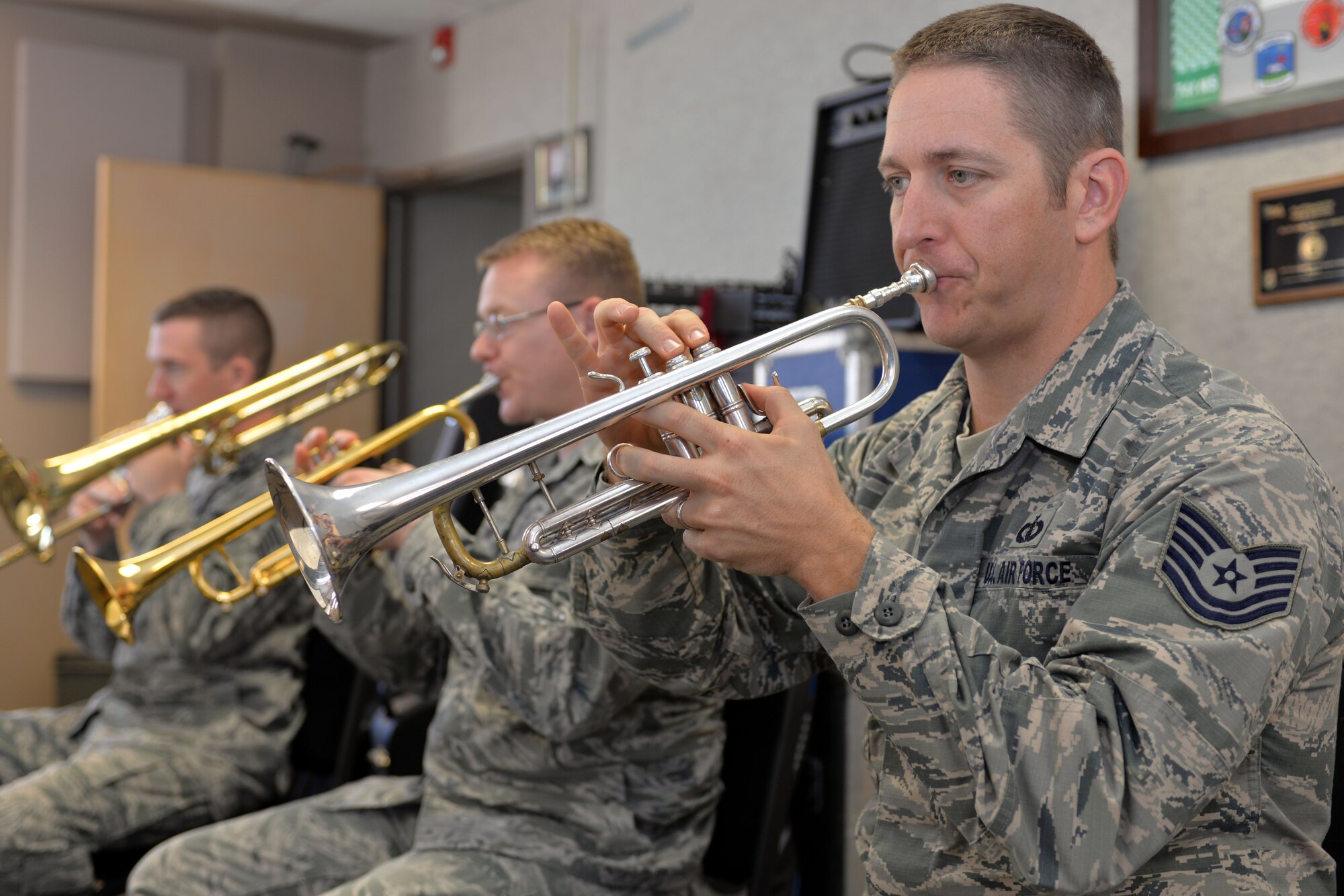 Heartland of America Band members (from right to left) Tech. Sgt. Carl Eitzen, Staff Sgt. Daniel Thrower, and Master Sgt. Ben Kadow rehearse Nov. 15, 2016 at Offutt Air Force Base in preparation for the band's upcoming holiday concert series. The 16-piece band is scheduled to conduct four free holiday-themed performances in the local community starting Dec. 10 and ending Dec. 18, 2016.The series will kick-off with a performance Dec. 10 at 2 p.m. at the Glenwood Community High School Performing Arts Center in Glenwood, Iowa and is presented in partnership with the Glenwood-Opinion Tribune and the Glenwood Community School District. The band will perform again Dec. 16 at 7:30 p.m.; Dec. 17 at 7:30 p.m. and Dec. 18 at 2 p.m. at Bellevue East High School in Bellevue, Nebraska in the school’s auditorium and is presented in partnership with Suburban Newspapers. Information on how to get tickets for these free concerts will be posted soon on the band's website (www.heartlandofamericaband.af.mil) and Facebook page (search for USAF Heartland of America Band) as well as in ads in the Omaha World-Herald, Bellevue Leader and Glenwood Opinion-Tribune newspapers.
 