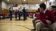 Members of the U.S. Air Force Honor Guard Drill Team perform a four-man routine in front of La Salle Academy students during a school visit in New York, Nov. 10, 2016. The drill team was one of many military performances and speakers during the La Salle Academy military day to educate students about the different branches of service. (U.S. Air Force photo by Senior Airman Philip Bryant)