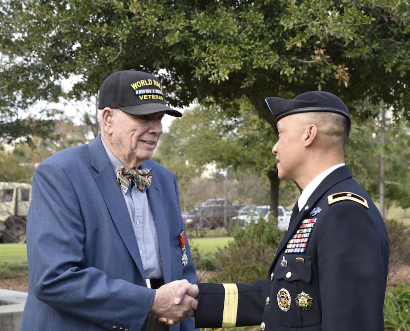 Brig. Gen. Viet Luong (right), USARCENT chief of staff, greets WWII Veteran David Phillips at the Florence, S.C. Veterans Day Ceremony Nov. 11, at the Florence, S.C. Veterans Park.