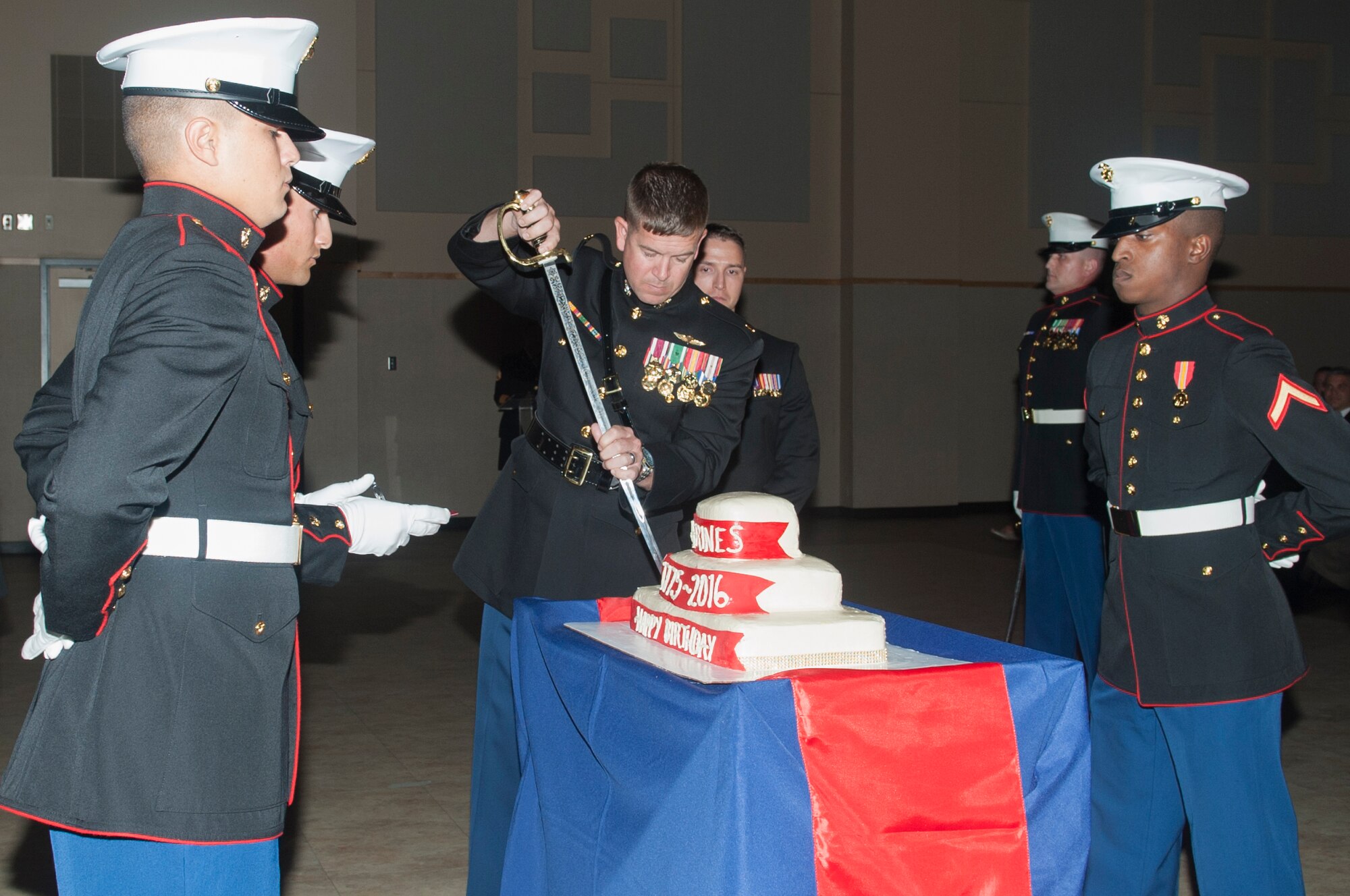 U.S. Marine Corps Maj. Andrew Armstrong, Marine Corps Detachment Goodfellow Commanding Officer, cuts the birthday cake during the Marine Corps ball at the McNease Convention Center, San Angelo, Texas, Nov. 12, 2016. The Marine Corps celebrated its 241st birthday. (U.S. Air Force photo by Staff Sgt. Laura R. McFarlane/Released)