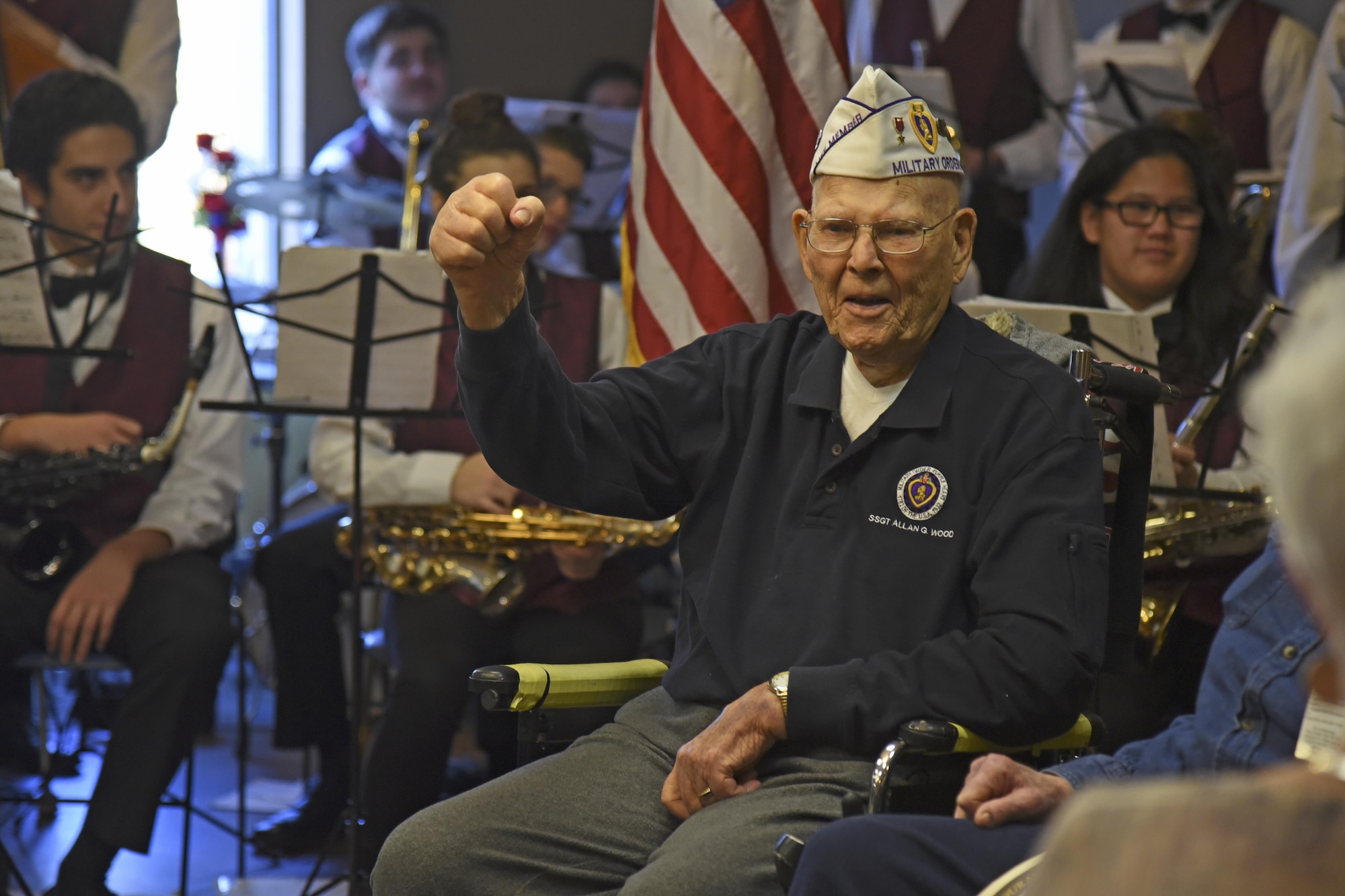 Retired Staff Sgt. Allen G. Wood, United States Army, celebrates during a Veterans Day celebration Nov. 12, 2016, at the Spokane Veterans Home. Wood was honored by the Combat Veterans Motorcycle Association for his years of service in the U.S. Army with the presentation of a handmade shadow box displaying medals received during the time of his service. (U.S. Air Force photo/Senior Airman Mackenzie Richardson)
