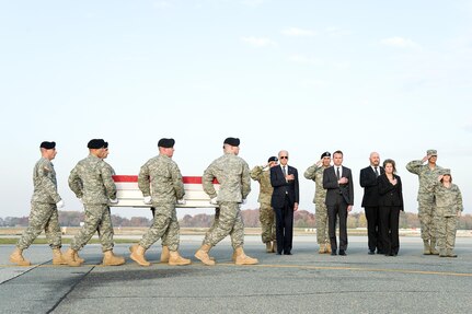 A U.S. Army carry team transfers the remains of Pfc. Tyler R. Iubelt, of Tamaroa, Ill., Nov. 15, 2016, during a dignified transfer at Dover Air Force Base, Del. Iubelt was assigned to Headquarters and Headquarters Company, 1st Special Troops Battalion, 1st Sustainment Brigade, 1st Cavalry Division, Fort Hood, Texas. (U.S. Air Force photo by Roland Balik)