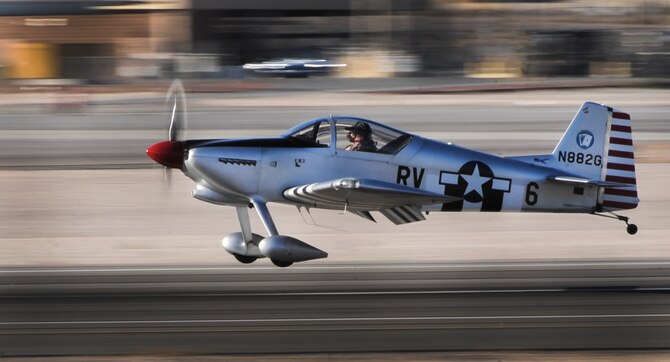An RV-6 lands after an aerial demonstration during the Aviation Nation air show on Nellis Air Force Base, Nev., Nov. 11, 2016. The aircraft was one of more than 60 acts and static displays showcased during the two-day event. More than 300,000 spectators came from around the world to watch the performances. (U.S. Air Force photo by Airman 1st Class Kevin Tanenbaum/Released)
