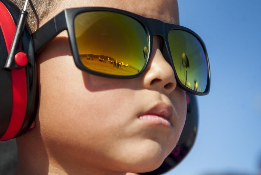 A boy watches the U.S. Air Force Thunderbirds demonstration team prepare for take-off during the Aviation Nation air Show on Nellis Air Force Base, Nev., Nov. 11, 2016. The air show brought more than 300,000 spectators from across the globe to experience "75 Years of Air Power." (U.S. Air Force photo by Airman 1st Class Kevin Tanenbaum/Released)