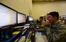 Airman 1st Class Barney Lopez and Airman Jordan Dean, traffic management apprentices assigned to the 28th Logistics Readiness Squadron, log shipments received for the day at Ellsworth Air Force Base S.D., Nov. 8, 2016. They log in shipments upon arrival to ensure the prompt delivery of products around the base. (U.S. Air Force photo by Airman 1st Class James L. Miller)