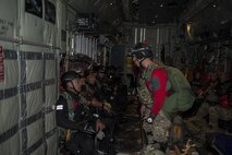 Airmen from the 31st Rescue Squadron and Japan Air Self Defense Force pararescuemen prepare for Exercise Keen Sword Nov. 10, 2016, off the coast of Okinawa, Japan. During Keen Sword, the 17th SOS and JASDF worked together for exercises such as a mass casualty exercise, coordinating rescue efforts. (U.S. Air Force photo by Senior Airman Lynette M. Rolen/Released)