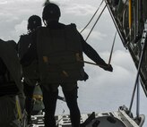 Japan Air Self Defense Force pararescuemen jump out of an MC-130J Commando II during Exercise Keen Sword Nov. 10, 2016, off the coast of Okinawa, Japan. Keen Sword is an annual exercise which strengthens interoperability between JASDF and U.S. combat rescue teams. (U.S. Air Force photo by Senior Airman Lynette M. Rolen/Released)
