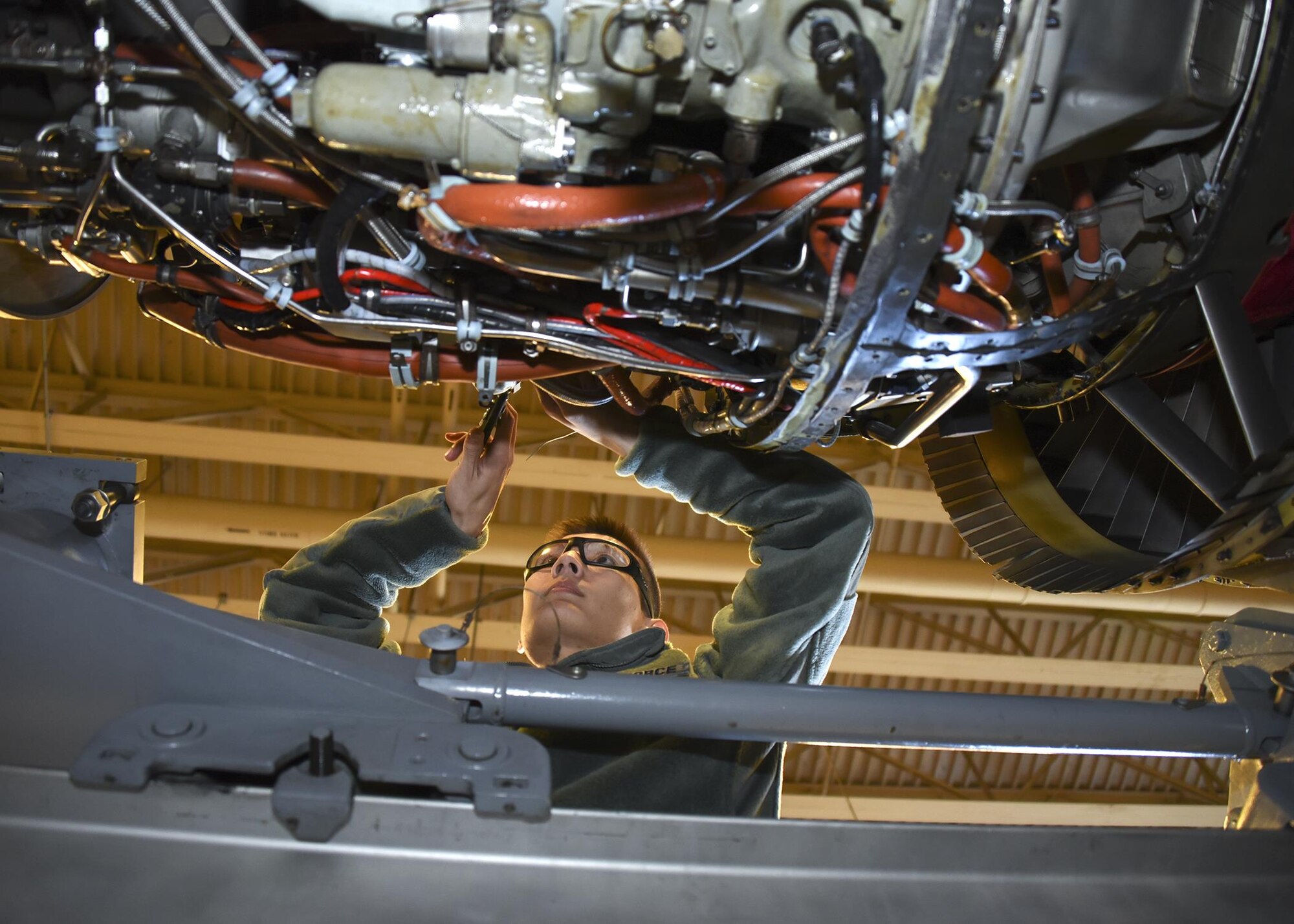 SrA Jimmy Vu works on an A-10 engine Nov. 5, 2016 at Warfield Air National Guard Base, Middle River, Md. Vu is the Maryland Air National Guard November Spotlight Airman. (U.S. Air National Guard photo by Airman 1st Class Enjoli Saunders/RELEASED)