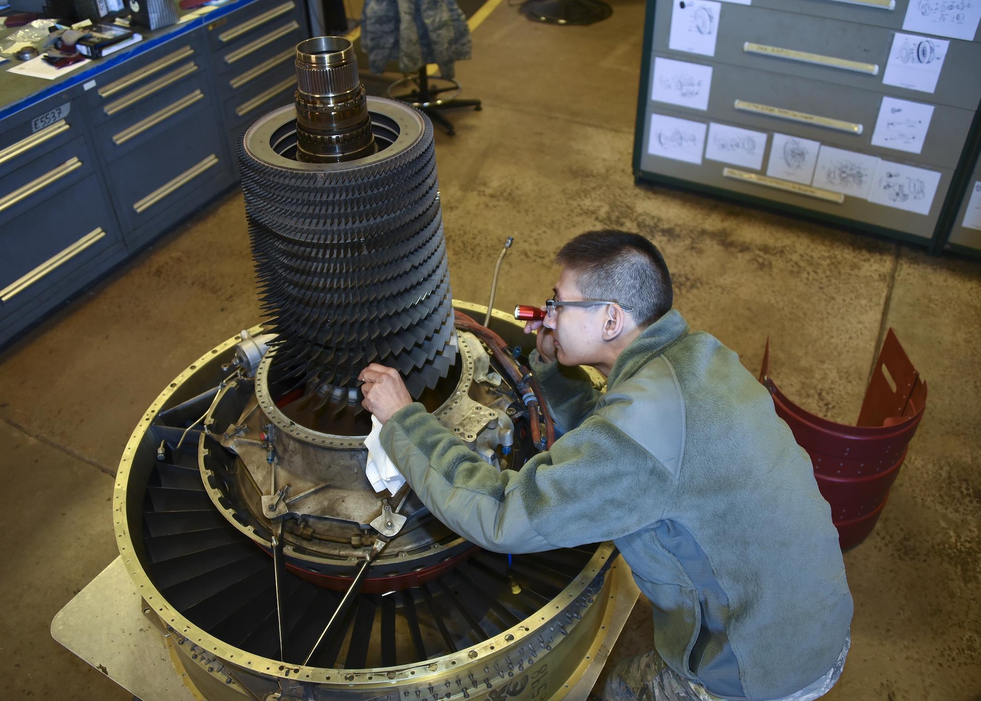 SrA Jimmy Vu is inspecting an A-10 engine Nov. 5, 2016 at Warfield Air National Guard Base, Middle River, Md. Vu is the Maryland Air National Guard November Spotlight Airman. (U.S. Air National Guard photo by Airman 1st Class Enjoli Saunders/RELEASED