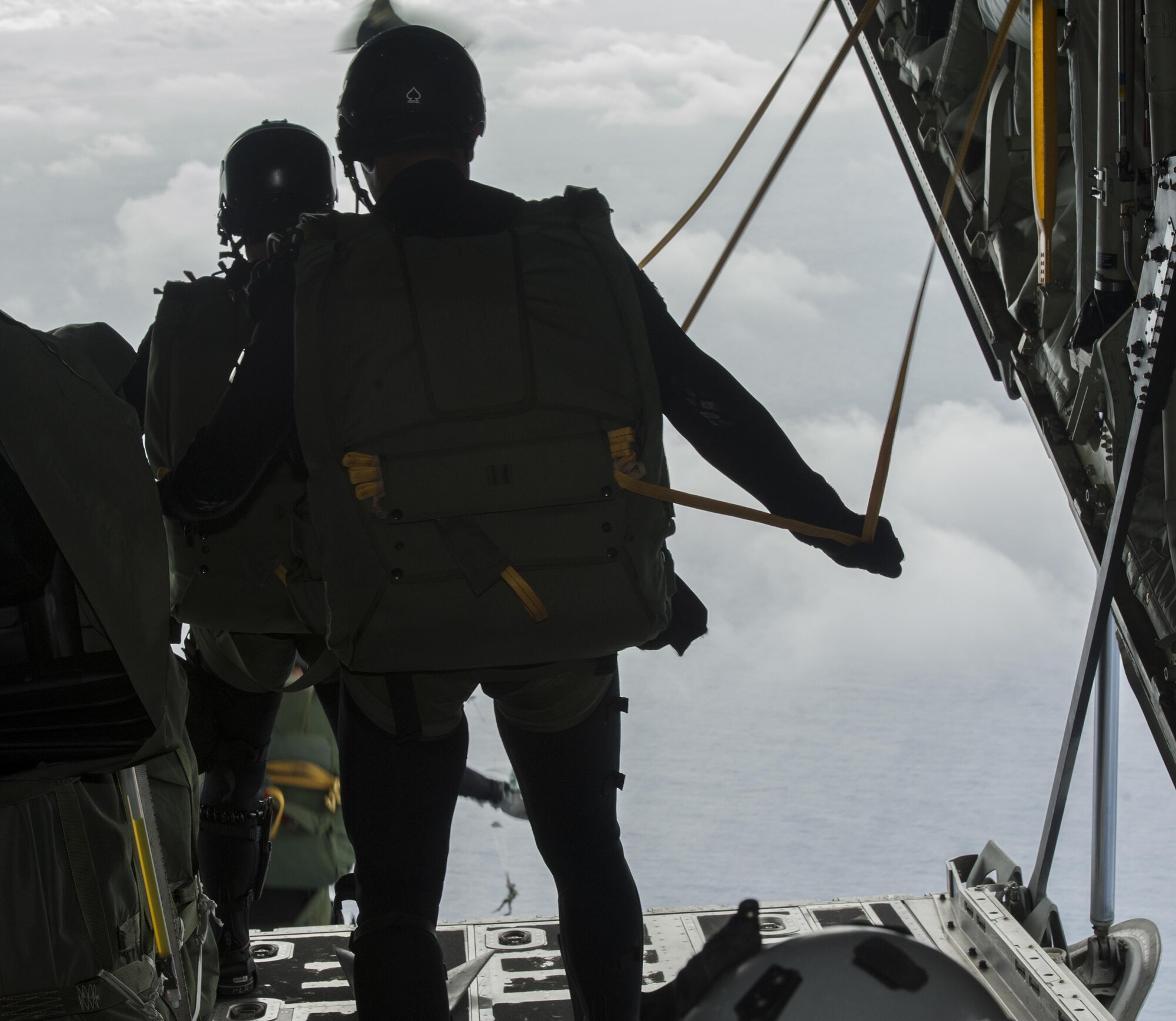 Japan Air Self-Defense Force pararescuemen jump out of an MC-130J Commando II during Exercise Keen Sword 17 Nov. 10, 2016, off the coast of Okinawa, Japan. Keen Sword is an annual exercise which strengthens interoperability between JASDF and U.S. combat rescue teams. (U.S. Air Force photo by Senior Airman Lynette M. Rolen/Released)