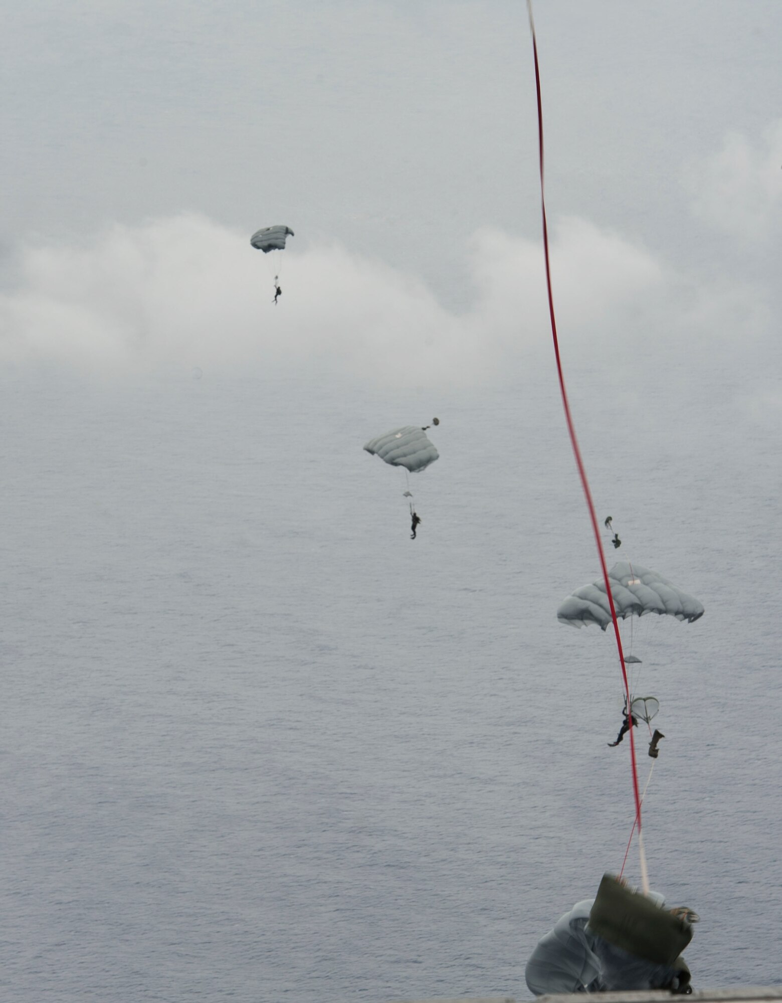 Japan Air Self-Defense Force pararescuemen jump out of an MC-130J Commando II during Exercise Keen Sword 17 Nov. 10, 2016, off the coast of Okinawa, Japan. Exercise Keen Sword tests the readiness of U.S.-Japan forces when responding to a scenario. (U.S. Air Force photo by Senior Airman Lynette M. Rolen/Released)