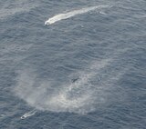 Japan Air Self-Defense Force HH-60G Pavehawks respond to a mass casualty exercise during Exercise Keen Sword 17 Nov. 10, 2016, off the coast of Okinawa, Japan. JASDF works with U.S. forces during Exercise Keen Sword, maintaining proficiency in the Pacific. (U.S. Air Force photo by Senior Airman Lynette M. Rolen/Released)