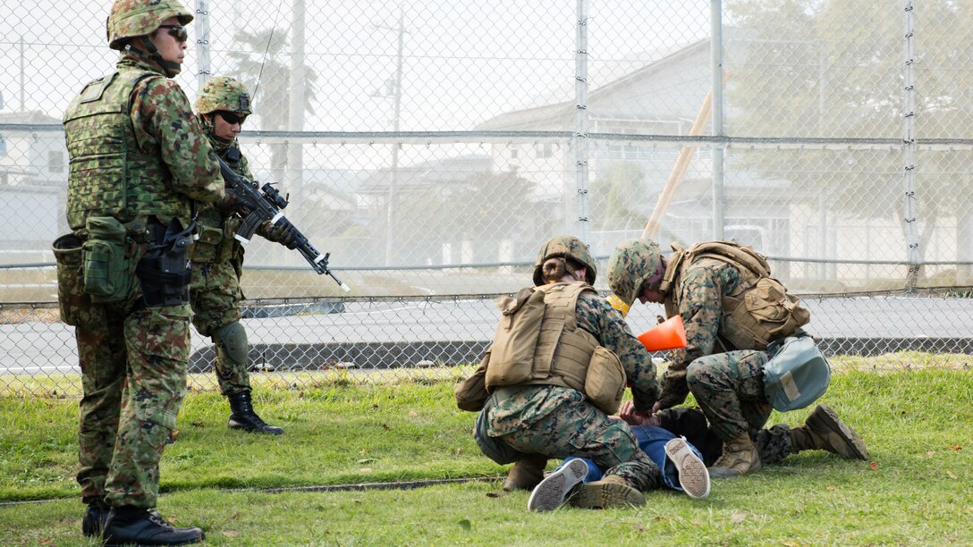U.S. Marines and Japan Ground Self Defense Force members executed exercise Active Shield at Marine Corps Air Station Iwakuni, Japan, Nov. 9, 2016. Active Shield is an annual exercise designed to test the abilities of U.S. and Japanese forces to work alongside each other to protect and defend Marine Corps Air Station Iwakuni and other U.S. assets in the region. 