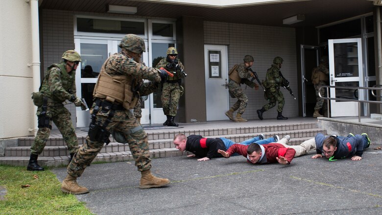 U.S. Marines and Japan Ground Self-Defense Force members executed exercise Active Shield at Marine Corps Air Station Iwakuni, Japan, Nov. 10, 2016. Active Shield is an annual exercise designed to test the abilities of U.S. and Japanese forces to work alongside each other to protect and defend Marine Corps Air Station Iwakuni and other U.S. assets in the region. 