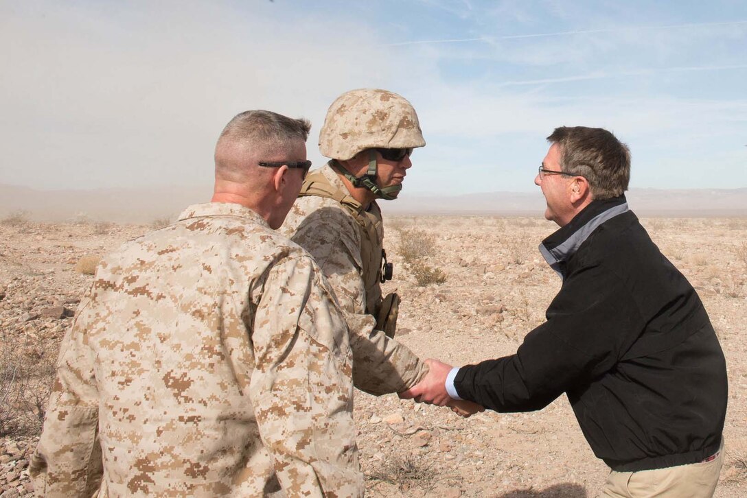 Defense Secretary Ash Carter shakes hands with Marines before observing a training exercise at Marine Corps Air Ground Combat Center at Twentynine Palms, Calif., Nov. 15, 2016. DoD photo by Army Sgt. Amber I. Smith