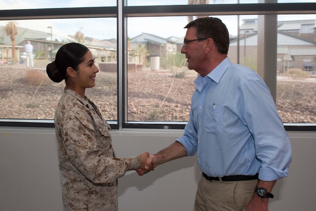 Defense Secretary Ash Carter shakes hands with a Marine at Marine Corps Air Ground Combat Center atTwentynine Palms, Calif., Nov. 15, 2016. DoD photo by Army Sgt. Amber I. Smith